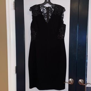 Black w sheer lace in the back. Elie Tahari cocktail dress size 12.
